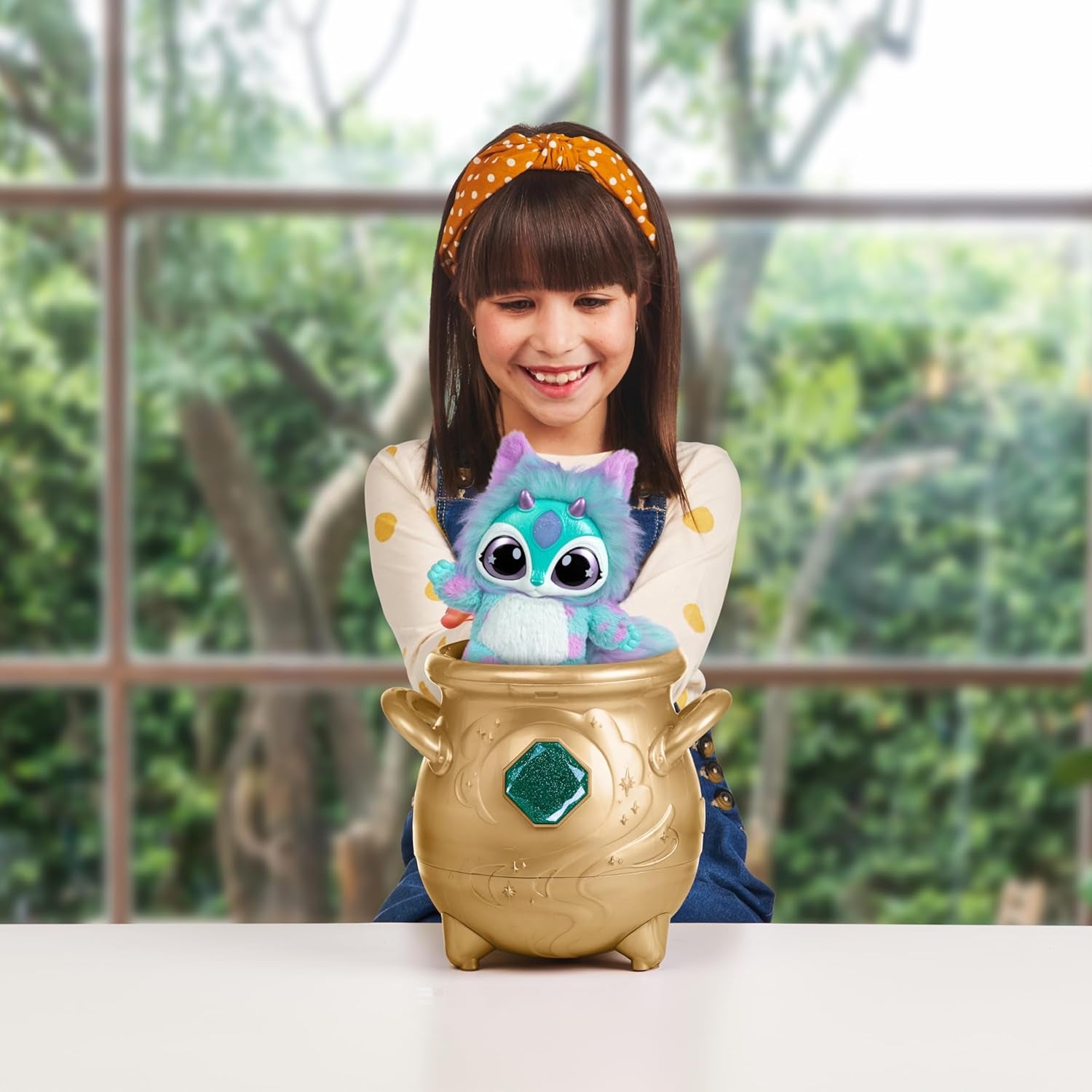 - Magical Real Misting Gold Cauldron with 8 Inch Non-Electronic Plush Toy. Follow the Spell Book Add the Magic Ingredients. Who Will You Magically Create?