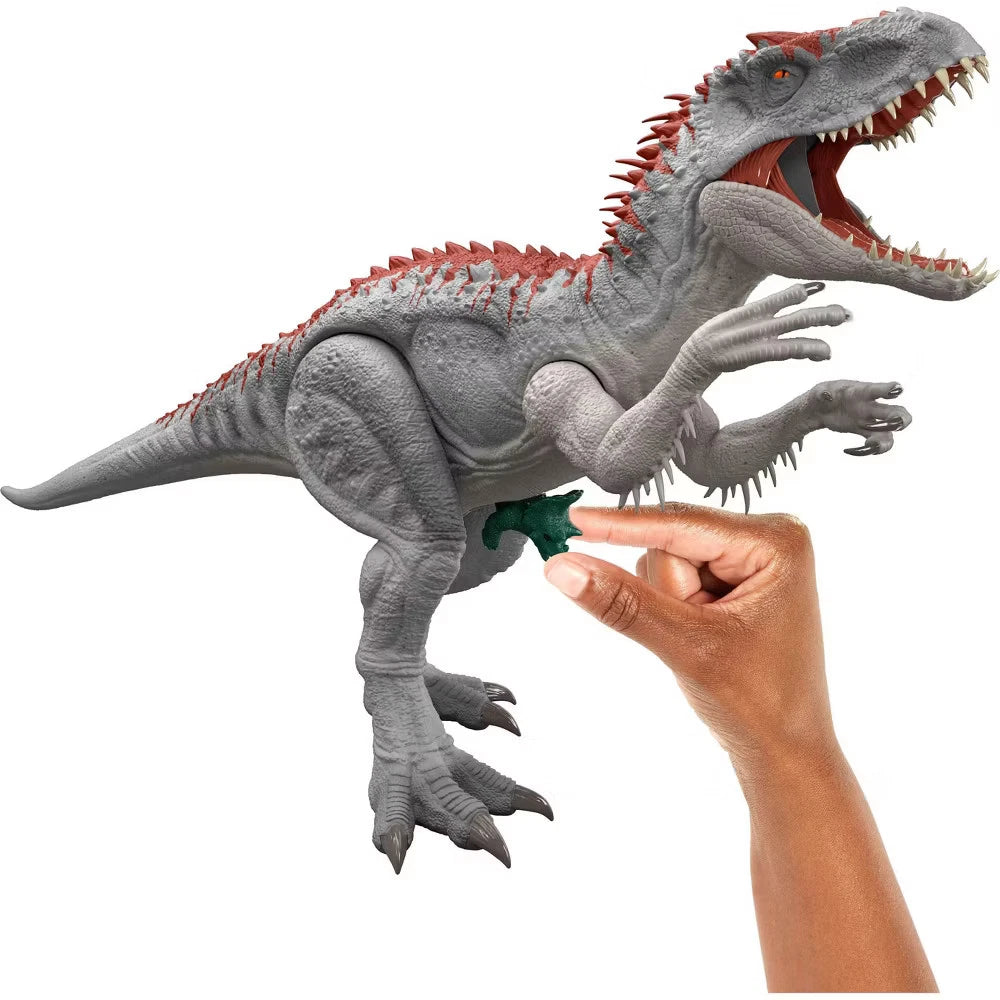 Toy dinosaur with a hand holding a green button on a white background