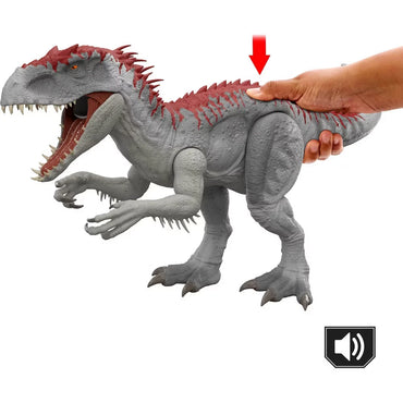 Toy dinosaur with a hand pressing a button on its back, set against a white background.