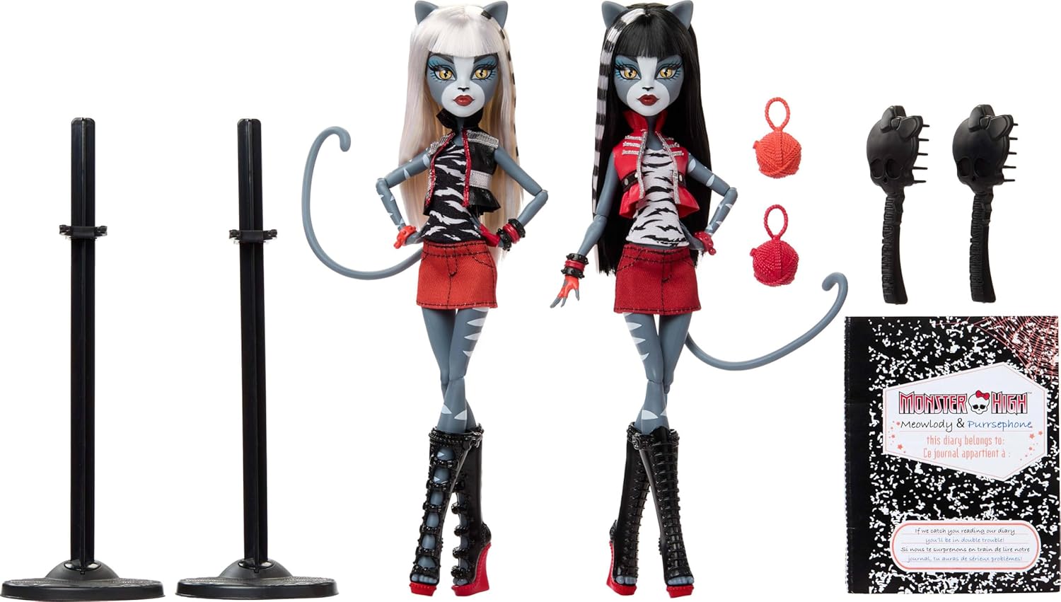Monster High dolls with accessories on a white background