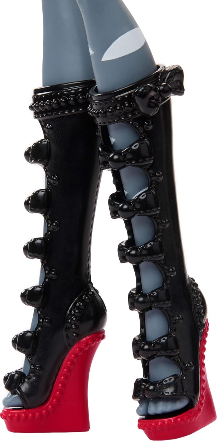 Black high-heeled shoes with red soles on a white background